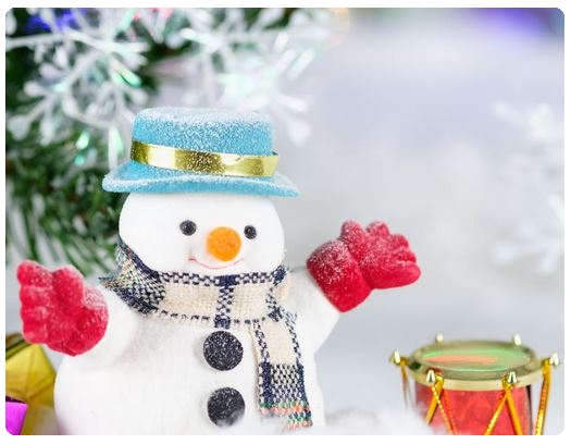 A snowman, tree and presents